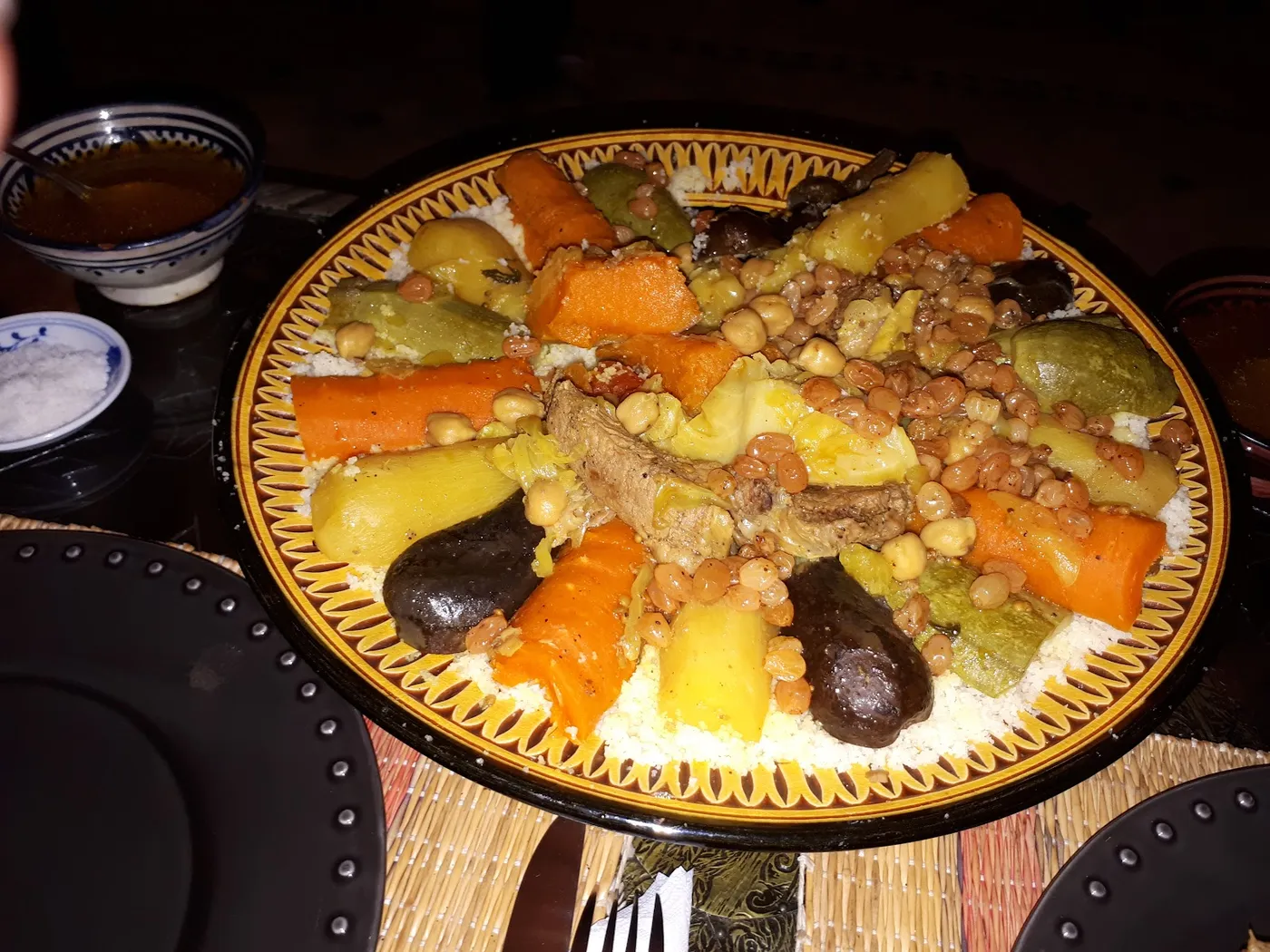 A royal couscous served in a painted tagine dish